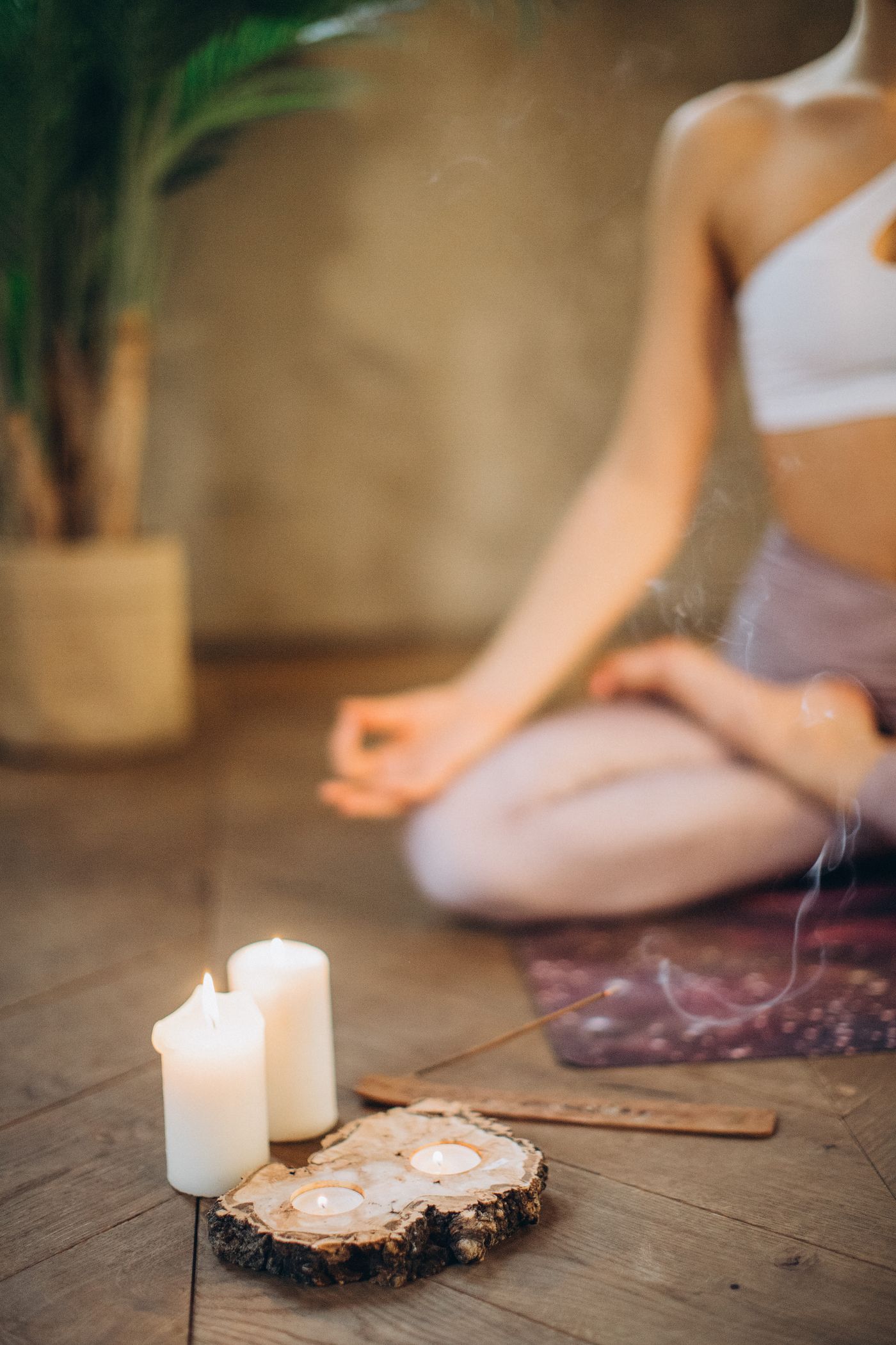 Person in a calm yoga pose in a bright studio